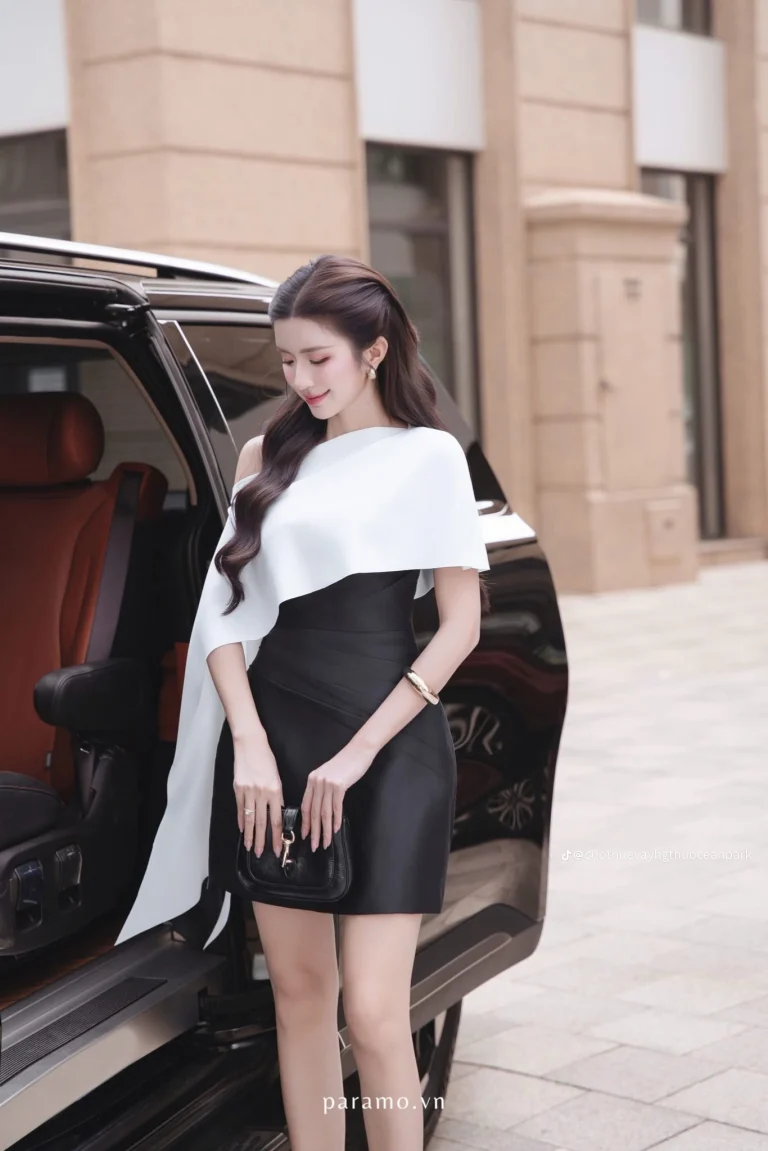 Pass váy đen ngắn + choàng Páramo – size M